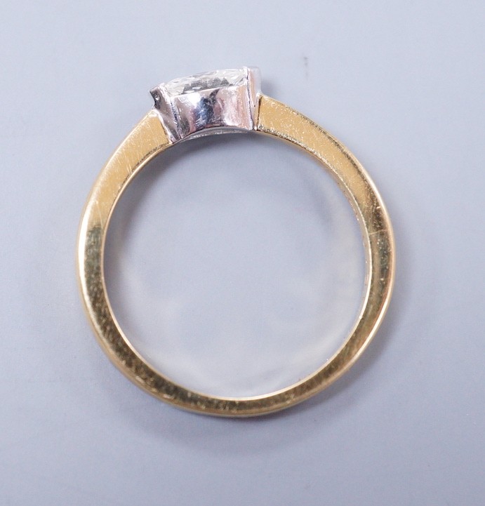 A modern 18ct gold and solitaire marquise cut diamond set ring, size L, gross weight 3 grams